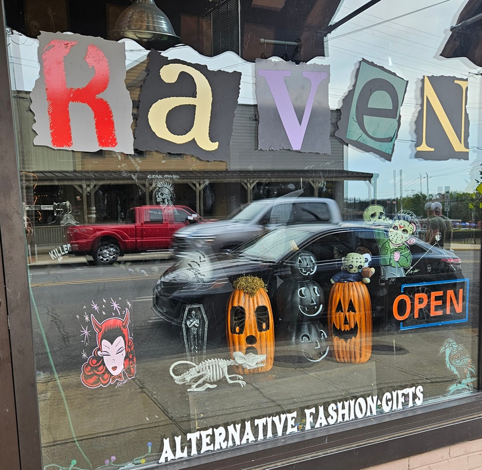 The front window of The Raven, at 246 Ouachita Avenue in Hot Springs, Arkansas.